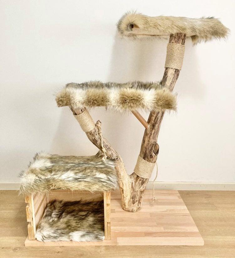 Photo of The big cat tree. Cat scratcher made from real tree