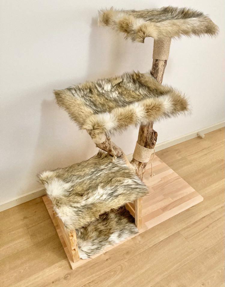 Photo of The big cat tree. Cat scratcher made from real tree