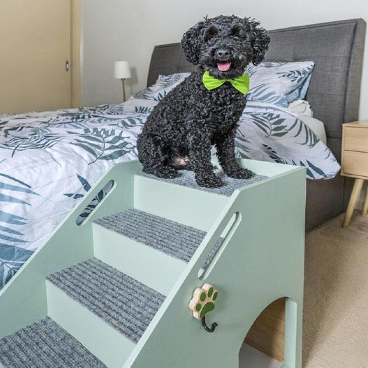 Photo of the Mini to Max Bed Stairs with toy poodle. Dog stairs suitable for bed